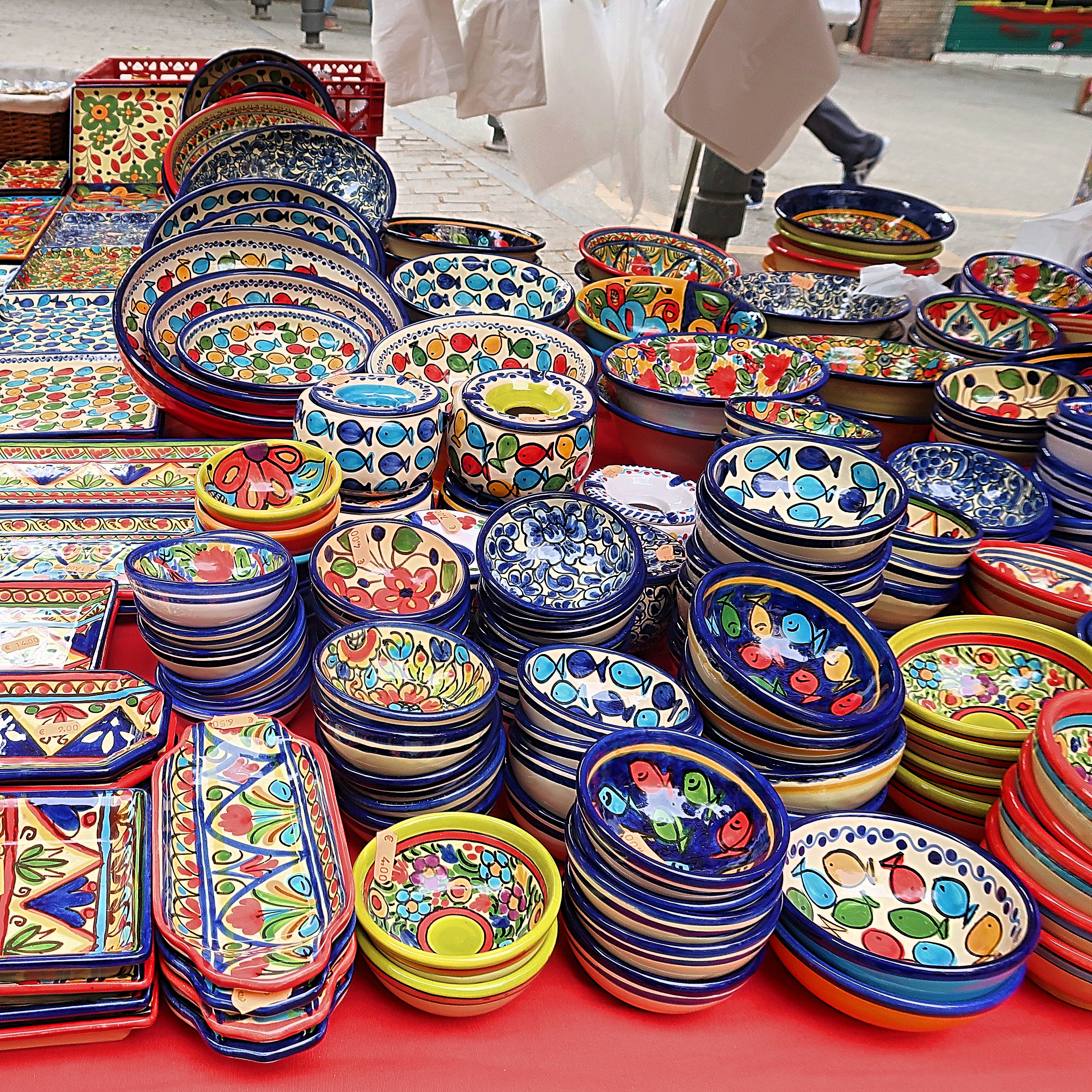 Market stall with colourful crockery at El Rastro 