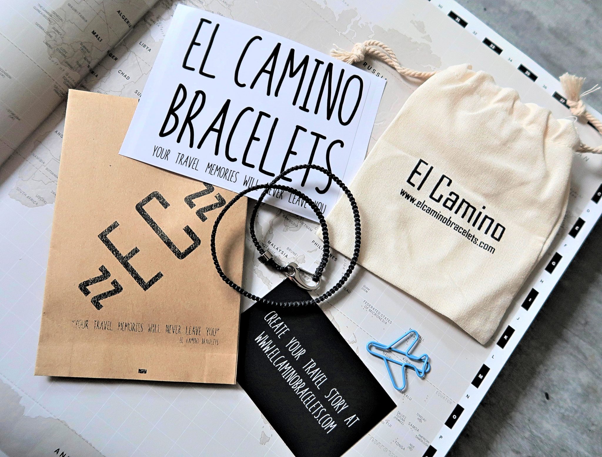 El Camino - Flat lay with bracelet, packaging and sticker. 